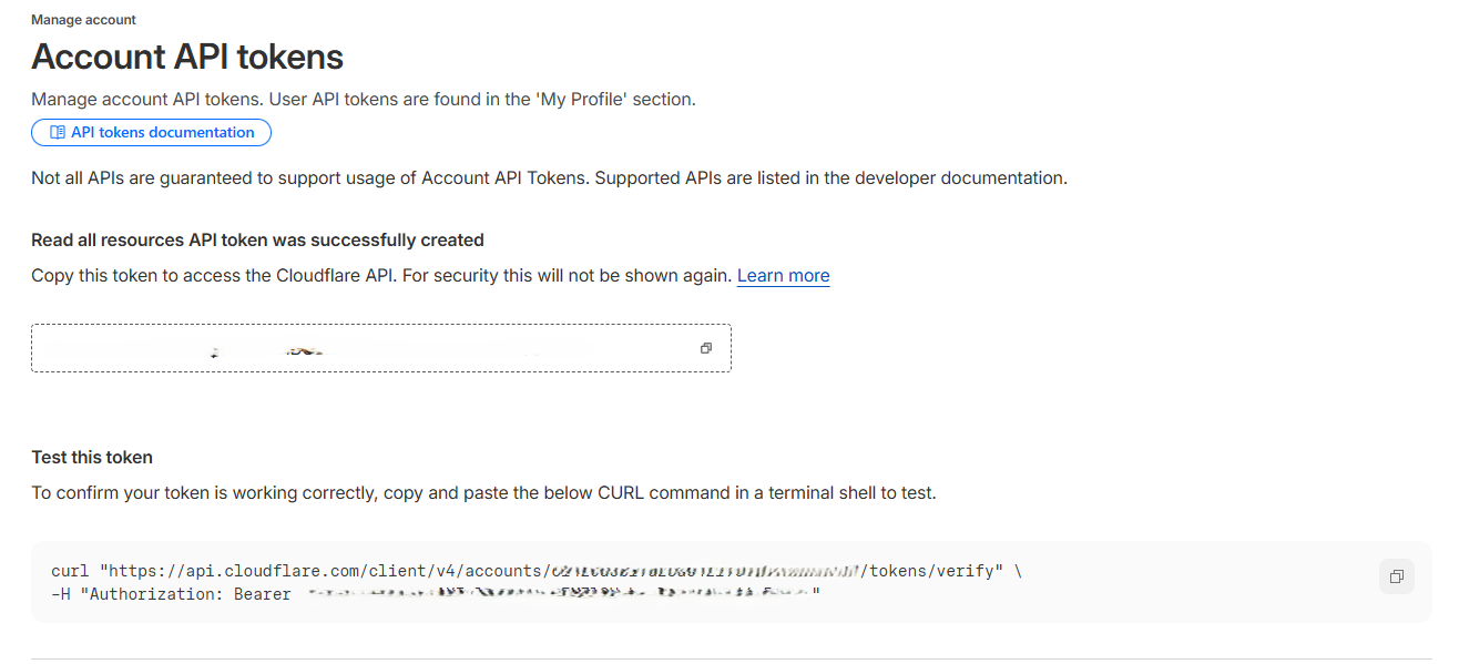Screenshot of Cloudflare API token creation confirmation with token value highlighted